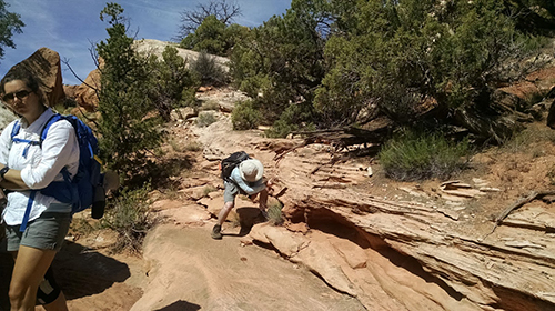 Students outside from geology class on a trip.