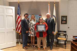 Hannah Wilson with Dr. Kent, President Jo Bonner, and Dr. Raj