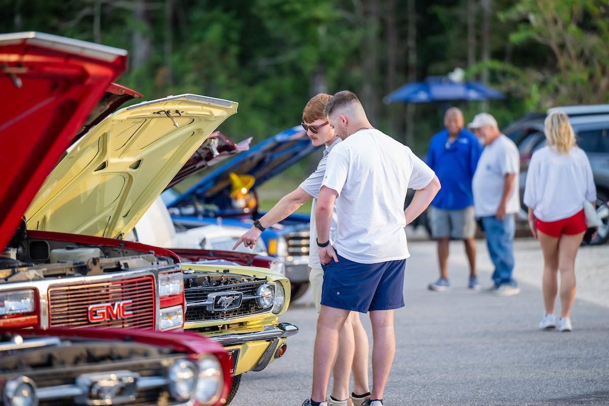 Students viewing antique cars&nbsp;
